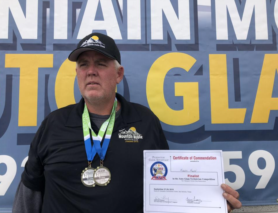 Kevin Kerr with his Competition Medals and Certificate